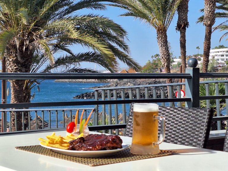 Beer and ribs with sea view
